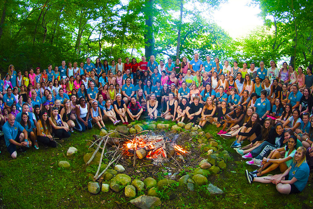 Evenings at a USA Summer Camp are where the magic really happens. After dinner, campers and counsellors gather for big camp-wide activities.