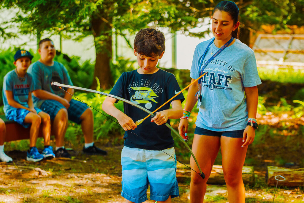 Archery is a camp classic! Teaching kids how to master a bow and arrow is about more than hitting the bullseye – it’s about focus, patience, and achievement