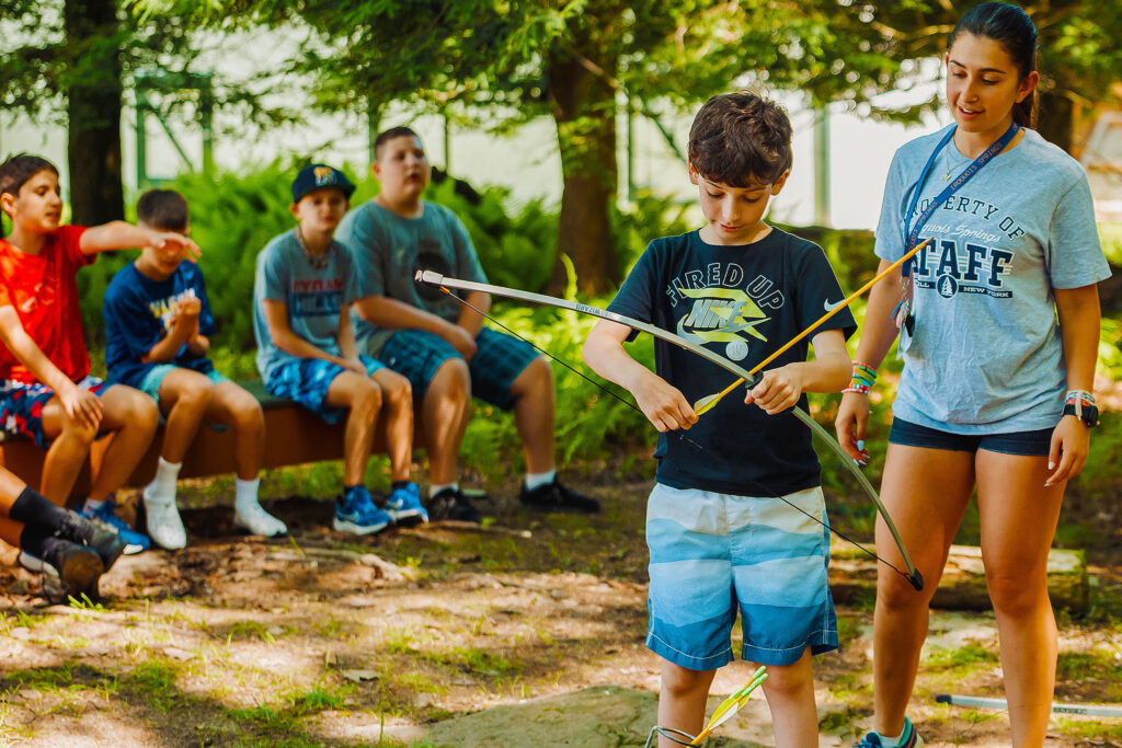 Archery coach teach campers valuable skills, lead them on adventures, and watch them discover a love for the outdoors.
